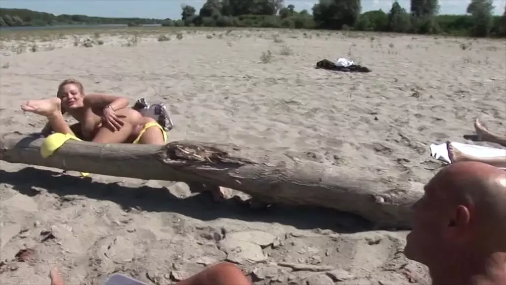 a beauty blonde looking at you for fuck on the beach