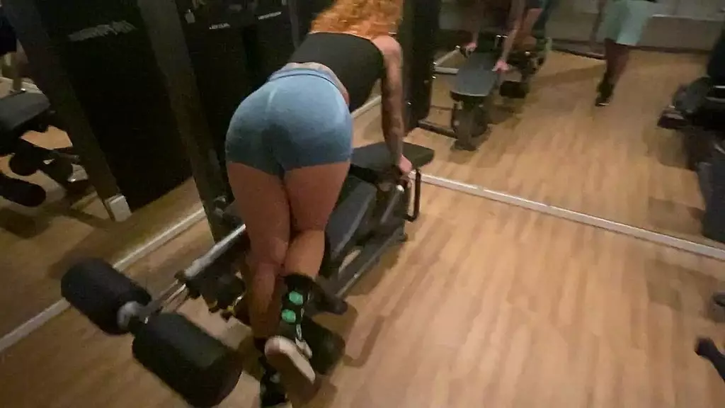 naughty redhead was surprised at the gym by her friend and fell head over heels before being fucked